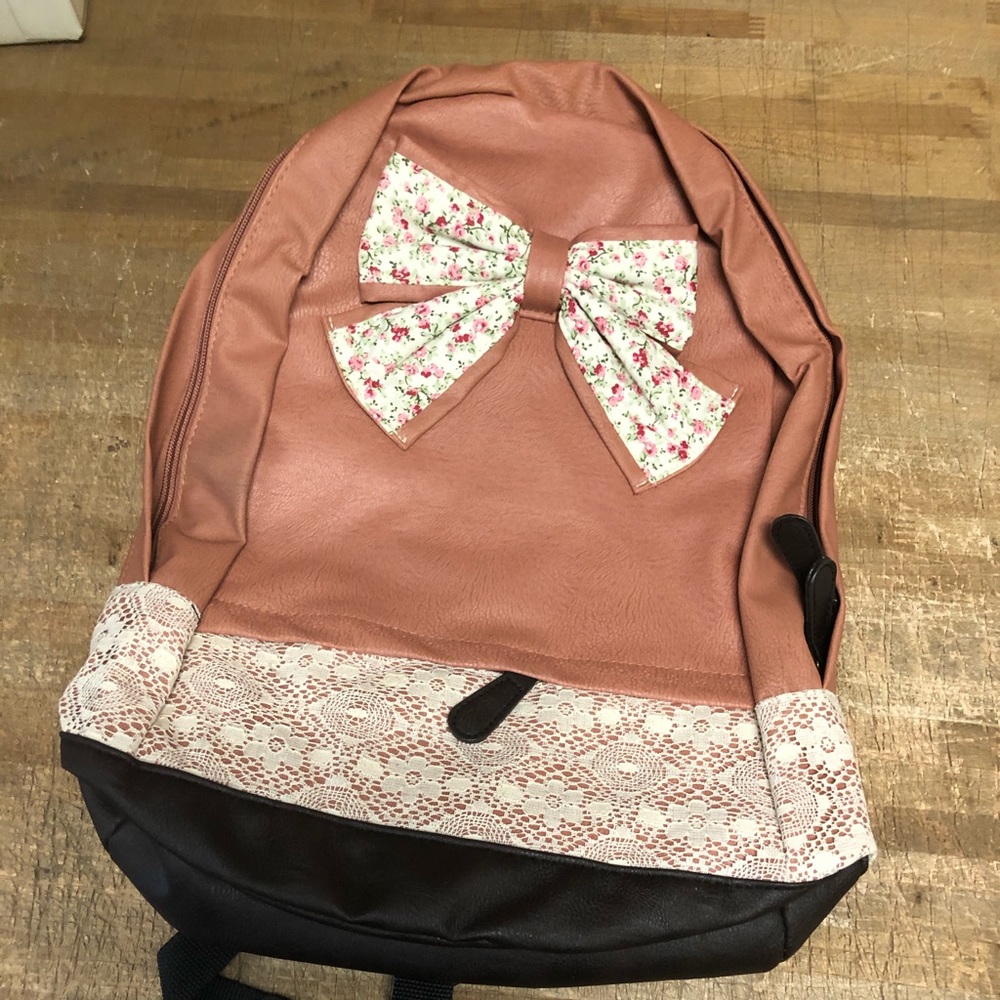 Leather and lace backpack